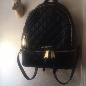 Micheal Kors leather quilted backpack